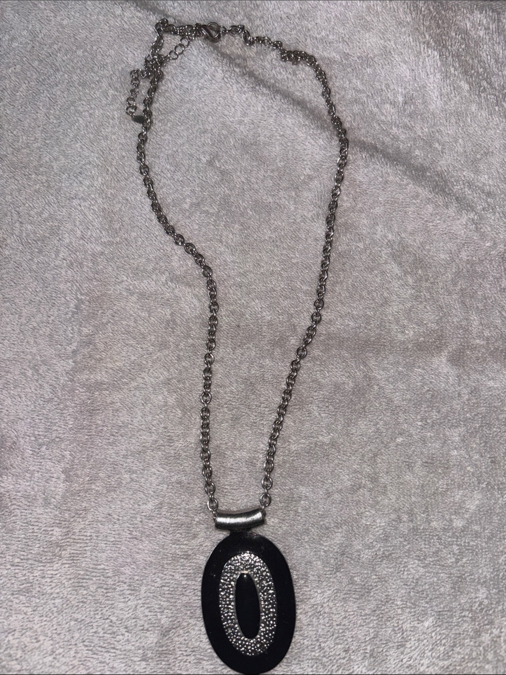 Silver Chain Necklace with Black Oval Pendant and Crystal Accent